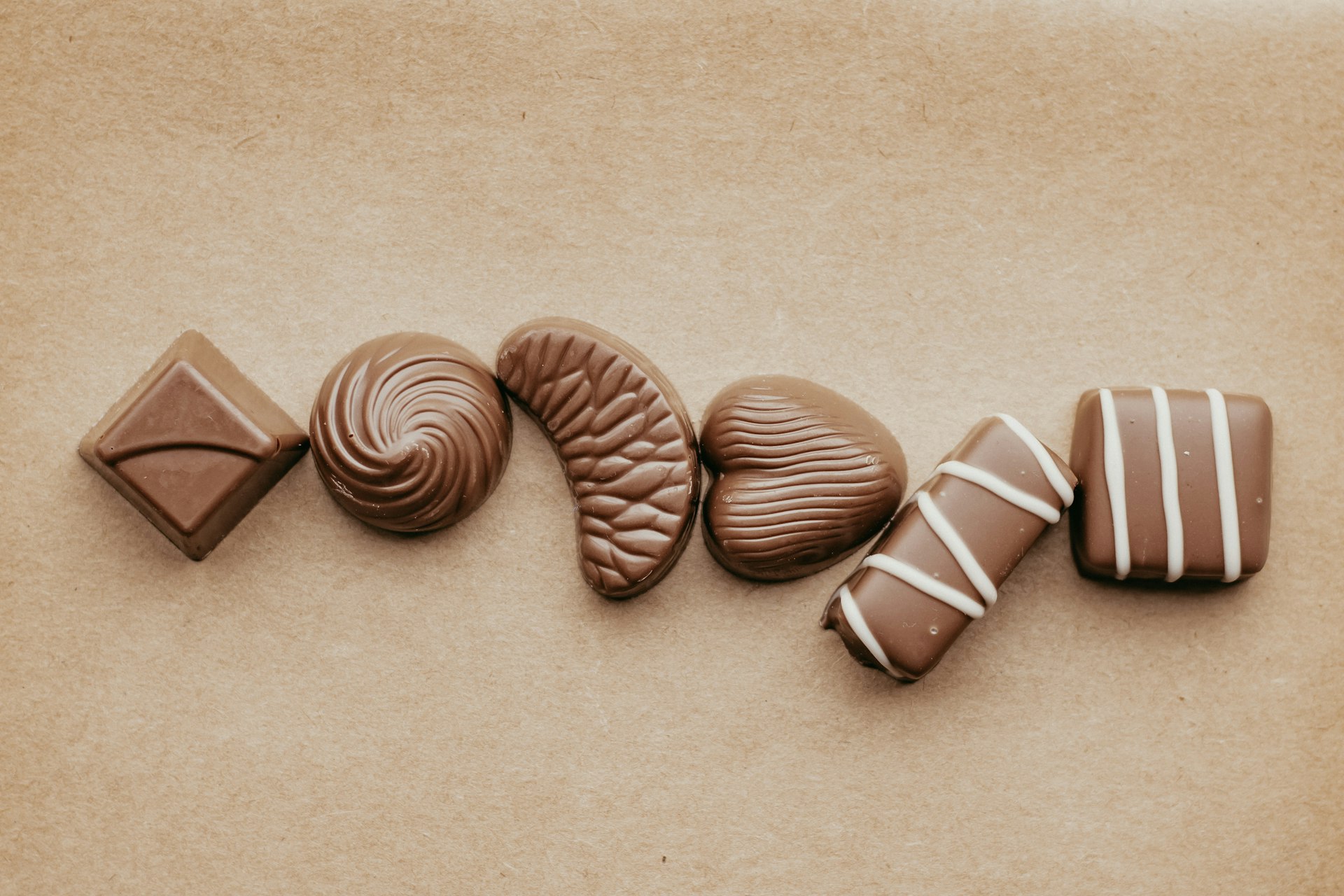 A group of chocolate candies sitting on top of a table